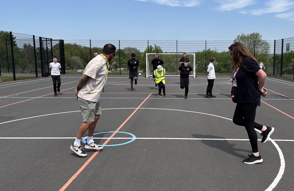 Breakfast Show presenters exercise with the children